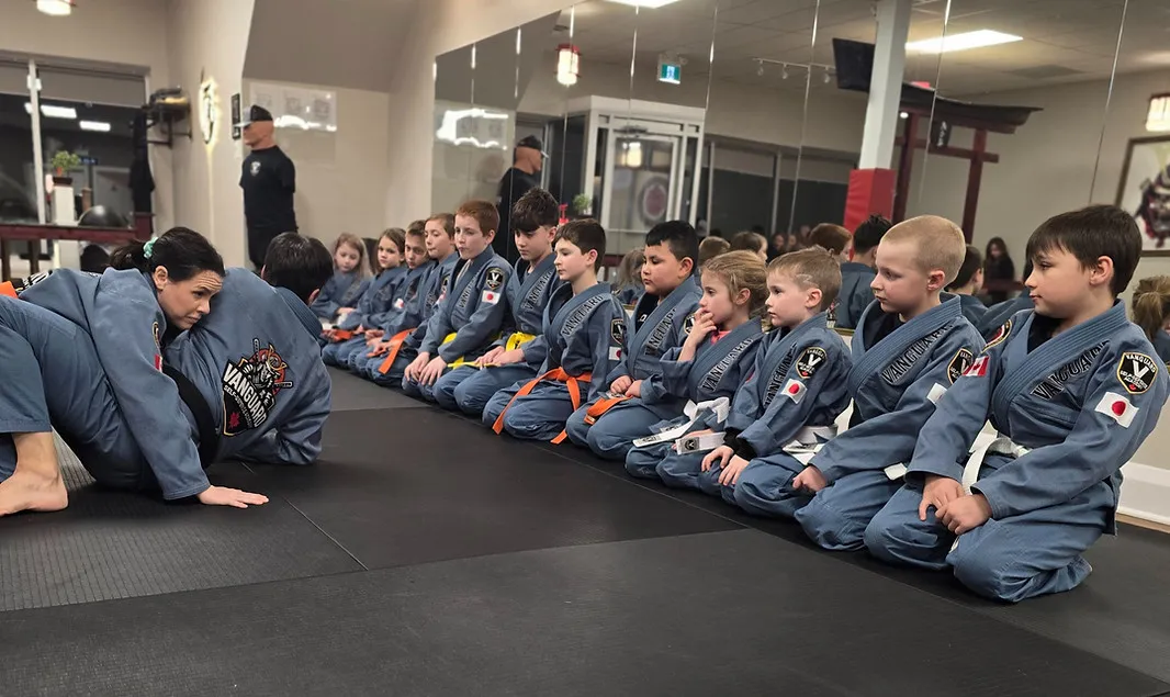 Vanguard instructor observing an adult self-defense technique